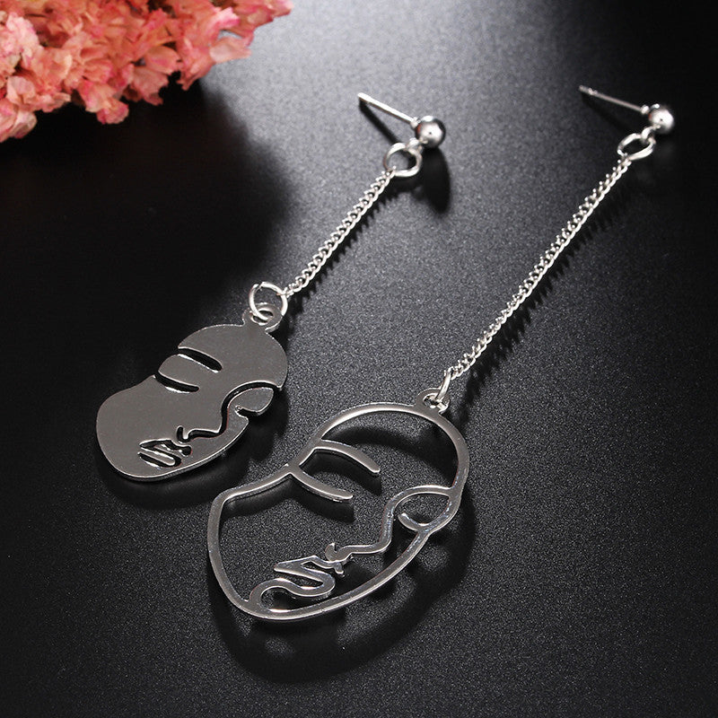 Woman Head Earrings